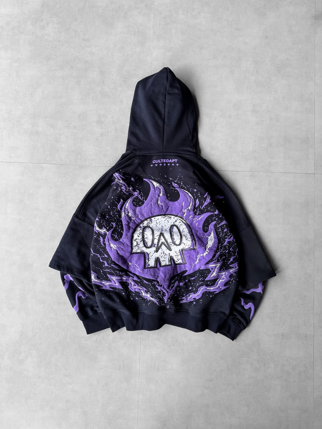 Navy skull head puff-print oversized hoodie — detail