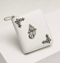 White card wallet with cast tongue emblem and filigree cross detailing