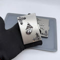 Brushed silver metal card holder with cast tongue emblem