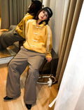 Striped velvet bomber jacket in yellow - front