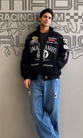 Printed rider sports jacket in black - front