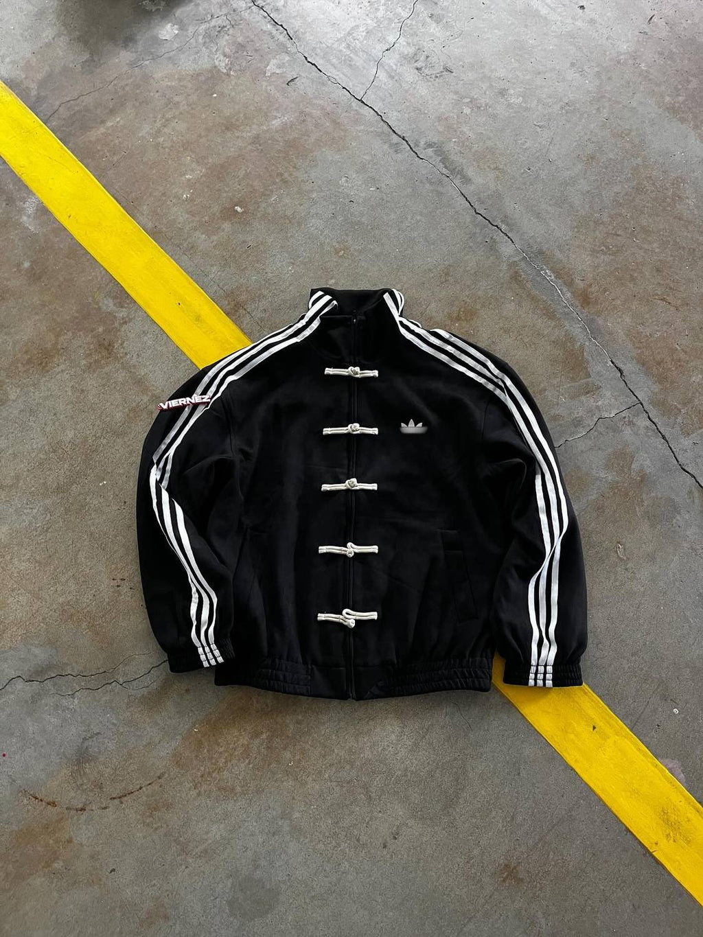 Striped suede bomber jacket in black - close up