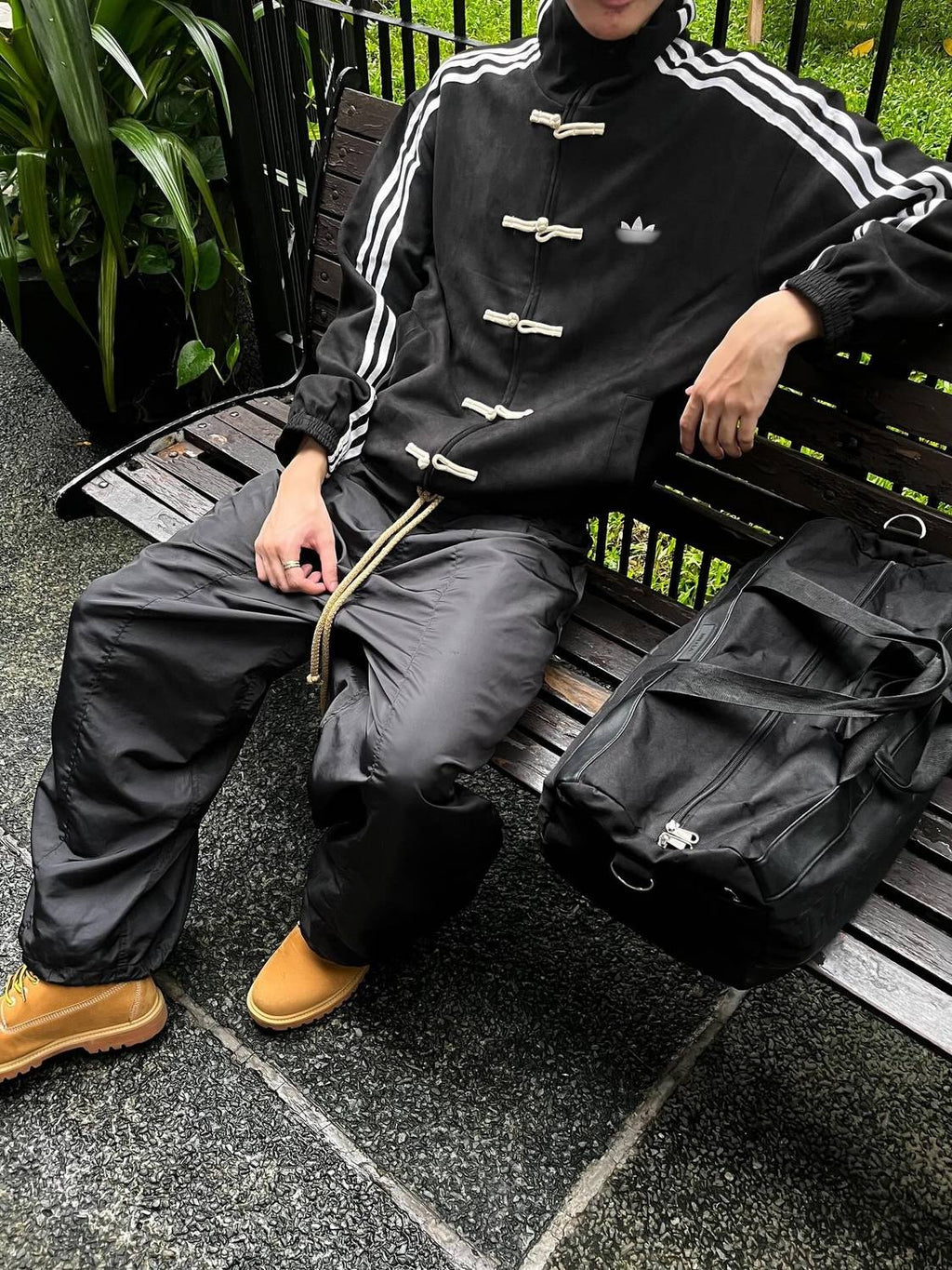 Striped suede bomber jacket in black - front